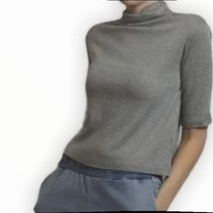 The Temple Top By Mod Ref In Grey Is A Lightweight Top With A 3/4 Sleeve And Cowl Neck For Everyday Wear. 35% Acrylic, 30% Cotton, 30% Rayon, 5% Spandex Gray 3/4 Sleeve Summer Top, Gray 3/4 Sleeve Top For Summer, Gray Summer Top With 3/4 Sleeves, Casual Gray Tops With 3/4 Sleeve, Fitted Half-sleeve Tops For Spring, Fitted Half Sleeve Tops For Spring, Solid Color Tops With 3/4 Sleeve For Day Out, Gray Half Sleeve Top For Fall, Trendy 3/4 Sleeve Top For Layering