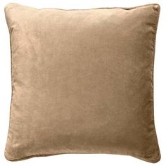 a beige pillow on a white background