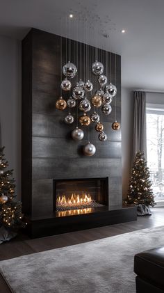 a living room with a fire place and christmas decorations on the wall above it's fireplace