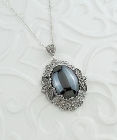 Silver Large Hematite Pendant Necklace, Handmade Floral Filigree Oval Statement Pendant with Big Metallic Gray Stone, 925 Sterling Silver Silver gift for mom, bouquet pendant, Nature necklace, wedding gift her, bridesmaid gift her, daisy pendant Gemstone: Hematite 18x25mm  ( NICKEL FREE ) Chain Length:  -21 Inches ( 53 cm ) -18 Inches + 2 Inches Extender ( 46 cm + 5 cm Extender ) Pendant height and width: -1.65 Inch X 1.3 Inch // 4.2cm X 3.3cm  -The Silver Large Hematite Pendant Necklace is a st Silver Oval Cabochon Necklace For Formal Occasions, Silver Oval Victorian Necklace, Silver Victorian Oval Necklace, Victorian Silver Oval Necklace, Ornate Silver Oval Cabochon Jewelry, Silver Oval Cabochon Necklace For Anniversary, Silver Oval Filigree Necklace, Mom Bouquet, Floral Filigree