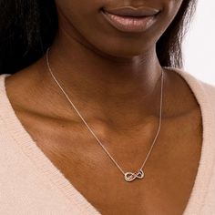 Make your bestie's day extra special with this playful infinity necklace. Fashioned in sterling silver, this choice features the word "Bestie" sculpted in 14K rose gold plate along the center of a looped infinity symbol shape. Diamond accents and beaded details add shimmer to the design. Polished to a bright shine, this 0.75-inch word art suspends centered along a 17.25-inch rope chain that secures with a spring-ring clasp. Loop Necklace, Rose Gold Plate, Peoples Jewellers, Necklace Clasps, Infinity Necklace, Infinity Symbol, Jewelry Repair, Precious Jewelry, Chain Ring