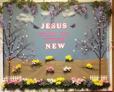 a bulletin board with flowers and trees on it that says jesus makes all things new