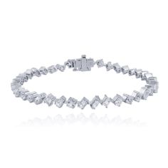 This stunning 14K Solid Gold Multi Shape White Topaz Tennis Bracelet, is crafted to perfection with a sophisticated mix of multi-shaped white Topaz gemstones. This luxury tennis bracelet exudes glamour and style, making it the perfect accessory to elevate any outfit, whether attending a special event or adding a touch of sparkle to your everyday look.Each white topaz gemstone is carefully set in a sleek 14K solid gold framework, creating a seamless flow of brilliance. The unique combination of r White Bracelets With Baguette Diamonds As Gift, White Bracelets With Baguette Diamonds For Gift, Luxury White Diamond Baguette Cut Bracelet, White Tennis Bracelet With Baguette Diamonds, White Baguette Diamond Tennis Bracelet, Luxury White Baguette Cut Diamond Bracelet, White Diamond Bracelet With Baguette Diamonds For Gift, White Diamond Baguette Cut Bracelet, Elegant Diamond Multi-stone Bracelets