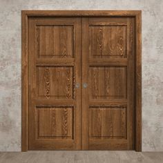 an empty room with two wooden doors on the wall and wood flooring in front of it