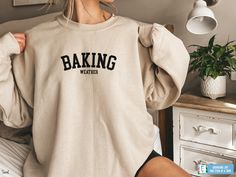 If you're looking for the perfect Baking shirt to wear when you cozy up to bake cookies this weekend, this Funny Baker Sweatshirt is for you! Whether you are an avid baker or looking for a chef gift, you are sure to love this funny gift for Baking lovers! ▸ Cozy Gilden 18000 Unisex Crewneck Sweatshirts are soft and durable!  ▸ All Colors are 50% Cotton 50% poly ▸ Unisex Adult Sizing - Please refer to the size chart in the listing images prior to placing your order ▸ Rolled Sleeves in pictures is Baking Outfit, Cooking Shirt, Funny Baking Shirts, Funny Running Shirts, Scarecrow Halloween, Etsy Wishlist, Funny Baking, Circuit Crafts, Funny Running