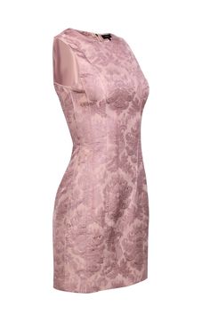 Add a touch of playfulness to your work wardrobe with this blush pink floral brocade dress. The textured fabric and sleeveless design make it perfect for transitioning from office to happy hour. Pair it with a nude pump for a polished look. Size S Shell 68% Viscose, 32% Cotton Lining 94% Polyester, 6% Spandex Covered back zipper Sleeveless Bust 34" Waist 26" Shoulder to hem 34" Mauve Sleeveless Dress With Floral Print, Feminine Fitted Sleeveless Pink Dress, Sleeveless Jacquard Mini Dress, Sleeveless Jacquard Mini Dress For Summer, Feminine Pink Sleeveless Dress For Formal Occasion, Elegant Sleeveless Jacquard Mini Dress, Pink Jacquard Summer Dress, Formal Fitted Sleeveless Dress With Floral Print, Elegant Pink Fitted Sleeveless Dress