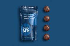 two chocolates and one bag of basic bits on a blue background