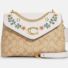 Gorgeous Bag By Coach. Signature Coated Canvas, Refined Pebble Leather And Nappa Leather Inside Zip And Multifunction Pockets Magnetic Snap Closure, Fabric Lining Outside Open Pocket Handles Convert To Shoulder Strap With 21 3/4" Drop 10 1/4" (L) X 6 3/4" (H) X 3 3/4" (W) Brand New With Tags