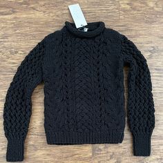 Nwt Adam Lippes Hi-Neck Thick Knit Sweater. Fitted Black Cable Knit Sweater, Hand Knitted Black Sweater For Winter, Black Fitted Cozy Sweater, Casual Black Merino Wool Sweater, Black Turtleneck Cable Knit Sweater, Black Wool Knitted Sweater, Black Merino Wool Casual Sweater, Fitted Wool Sweater With Chunky Knit, Fitted Chunky Knit Wool Sweater