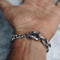 "925 Sterling silver Chunky Chain Bracelet with a toggle clasps. Available in women's and men's lengths. Makes a bold statement piece by itself or layer it for more style. Bracelet Length 15cm / 5.9\" inches 16cm / 6.3\" 17cm / 6.7\" 18cm / 7.09\" 19cm / 7.48\" Every piece is handcrafted in Bali and made with Intention, Love, and Soul so that it can be felt by it's wearer and ultimately change our energy and lives in a positive way. Each with it's own story of insight and love, our pieces, like Everyday Chain Link Bracelet With Sterling Silver Clasp, Sterling Silver Bracelet With Stainless Steel Clasp For Everyday, Silver Chain Bracelet With Stainless Steel Clasp For Everyday, Silver Chain Link Bracelet With Toggle Clasp, Sterling Silver Link Bracelets With Stainless Steel Clasp, Everyday Silver Chain Bracelet With Stainless Steel Clasp, Everyday Silver Bracelet With Toggle Clasp, Everyday Sterling Silver Bracelet With Toggle Clasp, Modern Link Sterling Silver Bracelet With Toggle Clasp