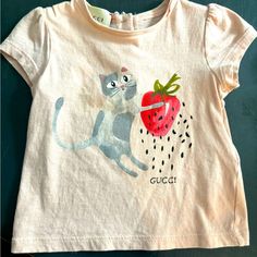 Gucci Infant Tshirt. Nwot Gucci Casual Summer Shirt, Casual Pink Gucci Top, Casual Gucci Summer Shirt, Casual Summer Shirt By Gucci, Casual Gucci Shirt For Summer, Gucci Short Sleeve Summer Shirt, Gucci Short Sleeve Shirt For Summer, Casual Gucci Tops For Summer, Gucci Cotton Graphic Tee