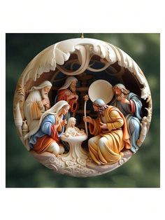 an ornament depicting the birth of jesus