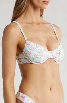 Take a dip or lounge poolside in this textured bikini top styled with supportive underwire cups and adjustable straps for a personalized fit. Clasps at back Adjustable straps Lined 74% nylon, 26% elastane Lined Hand wash, dry flat Imported