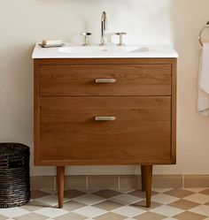 a bathroom vanity with two drawers and a sink