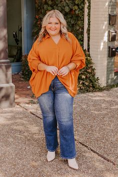 - Embrace trendy style with this new top! - Unlined material - A collared v-cut neckline - Pleated front detail - Long dolman sleeves with smocked cuffs - An oversized silhouette that ends in a straight hemline Measurements XL : Bust 80", Hip 74", Length 27", Sleeve Length 22", Waist 76". 1XL : Bust 82", Hip 76", Length 27.5", Sleeve Length 22.5", Waist 78". 2XL : Bust 84", Hip 78", Length 28", Sleeve Length 23", Waist 80". Orange Collared Blouse For Fall, Billowy V-neck Tops For Fall, Orange Collared Top For Fall, Oversized Collar Blouse For Fall, Chic Orange Collared Blouse, Chic Orange Collared Top, Casual Fall Blouse With Collared Neckline, Casual Billowy Blouse For Fall, Trendy Billowy Tops For Fall