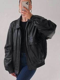 Channel your inner '90s fashion icon with this oversized women's bomber jacket, crafted from soft, lightweight napa black sheep leather. This jacket combines comfort and style, offering a relaxed fit that effortlessly layers over any outfit. The supple leather provides a luxurious touch, while the lightweight design ensures you can wear it all day without feeling weighed down. This jacket brings a nostalgic flair to modern wardrobes. The rich black hue adds versatility, making it easy to pair with everything from casual jeans to chic dresses. With spacious pockets for added practicality, this bomber is not just stylish but functional too. Perfect for any season, this vintage-inspired piece adds a touch of edge to your look while keeping you comfortable and stylish. Elevate your collection 90s Fashion Icons, Oversized Leather Jacket, Womens Biker Jacket, Straight Jacket, Lambskin Leather Jacket, Lycra Fabric, Retro Mode, Sheep Leather, Oversized Jacket