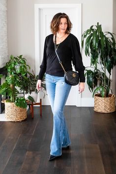 StyleDahlia wearing AG bootcut jeans, Madewell sweater and heeled boots. #gucci #styledahlia #denimoutfits #over40style #sweater #denimoutfits Madewell Sweater, Fashion Over 40