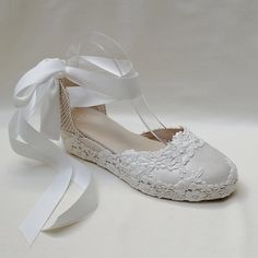 Bridal Spanish espadrilles handmade with love for you. Very comfortable,and glamorours. You can choose the model with bracelet, or with ribbon. Both are very beautiful, and elegant. Color: off white. Wedges: 5cm, Platform:2cm Elegant Cream Espadrilles For Beach, Elegant Cream Espadrilles For The Beach, Elegant Cream Espadrilles For Summer, Elegant White Espadrilles For Spring, Elegant Closed Toe Espadrilles For Beach, Elegant White Espadrilles For Beach, Elegant Flat Espadrilles, Elegant Beige Open Toe Espadrilles, White Lace-up Summer Wedding Shoes