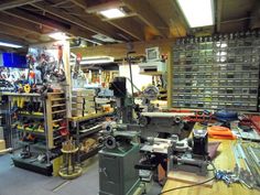 a room filled with lots of different types of workbench and tools on display