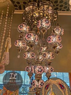 a chandelier hanging from the ceiling in a room