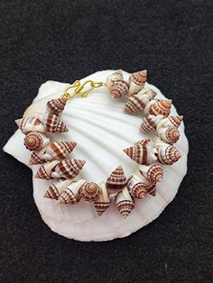 You will receive very beautiful  Shell Bracelet .   Many thanks for you visit my store ♥ if you have any question please contact us. For wholesale Price Please Convo me. You can order different items as many you like . Bracelet Seashell, Ocean Bracelet, Seashell Bracelet, Shell Bracelet, Nature Bracelets, Beach Jewelry, Sea Shell, Conch, Jewelry Gift