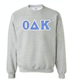 "Fraternity Lettered Crewneck! It's important to wear you letters on campus to grab the attention of new potential interests and show unity with your fellow brothers. This Lettered Crewneck is designed to do that while looking good and keeping you comfortable on those chilly fall afternoons hanging out on campus.   You now can choose any color crewneck with your group's letter colors automatically coming on the front as shown in the photos, truly making this your very own custom Greek lettered tee.  Please note this is a \"sim-stitch\" item, meaning simulated stitching. Letters are heat applied and not sewn on the garment. They do have the same look as a sewn item!" Delta Gamma Sorority, Delta Zeta Sorority, Fraternity Collection, Delta Sorority, Sorority Sweatshirts, Letter Sweatshirt, Alpha Gamma Delta, Gamma Phi Beta, Alpha Sigma Alpha