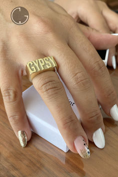 This 14ct Gold Man Pinky Ring is a perfect gift and a jewelry for everyday. We can produce this custom word ring in every name, number, date, letter so that this engraveble band can be personalized. This solid gold man pinky ring will also look so cool on woman as well. Nowadays it's a cool piece combined with daily outfits and this personalized band can be a perfect memory gift for him or her. Gold Ring With Custom Text, Custom Text Gold Ring, Gold Man, Word Ring, Number Date, Name Ring, Letter Ring, Name Rings, Gold Letter