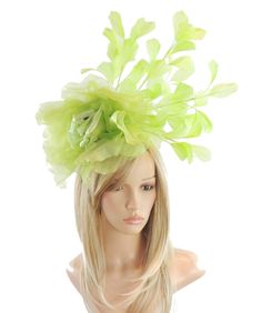 Hats By Cressida Ascot Fascinators, Wedding Hats & Kentucky Derby Hats Lime Green Hayley Feather and Silk Fascinator Hat A mass of lime green feathers surround a large cream and lime green silk rose flower Flower is about 10 inches wide, feathers about 8-10 inches We can do this in many colours Mounted with a matching headband. If you prefer a headband to match your hair, please make a note at check out what colour headband you want. The Hayley Fascinator Hat is perfect for any special occasion, whether it's a glamorous horse race like the Kentucky Derby or a formal affair like Royal Ascot. This stunning hat features a large silk rose flower, surrounded by a gorgeous mass of feathers, making it a truly elegant headpiece. It's perfect for the mother of the bride or any woman in need of a fo Elegant Headpiece, Church Tea Party, Lime Green Weddings, Green Feathers, Hat Headband, Horse Race, Tea Party Hats, Wedding Hat, Green Hat