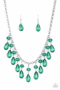 Featuring round and teardrop cuts, Ultramarine Green crystal-like tassels dangle from the bottom of a shimmery silver chain, creating an enchanting fringe below the collar. Features an adjustable clasp closure. Sold as one individual necklace. Includes one pair of matching earrings. P2WH-GRXX-361XX Collar Verde, Crystal Accessories, Paparazzi Accessories, Fabulous Jewelry, Green Necklace, Paparazzi Jewelry, Green Crystals, Necklace Earring Set, Faceted Bead