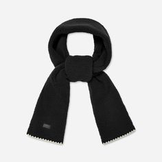 With a contrasting scallop trim, the UGG®fluff Scalloped Scarf puts a new twist on a classic winter accessory. | Plush fleece scarf. Self - 100% Polyester. Lining - Unlined. Features a scalloped trim on edge. 78 inch L X 7 inch W. Leather label with Graphic UGG® Font. Imported. | UGG® Women's UGG®fluff Scalloped Scarf Fleece Scarves in Black Ugg Scarf, Fleece Scarves, Fleece Scarf, Scallop Trim, Scarf For Women, Leather Label, Scalloped Trim, Cold Weather Accessories, Winter Accessories