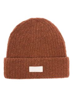 rust brown virgin wool blend knitted construction ribbed knit round crown turn-up brim logo patch to the front unlined pull-on style Casual Brown Acrylic Beanie, Fall Wool Ribbed Beanie, Brown Knitted Wool Beanie, Brimmed Brown Knitted Beanie, Brown Knitted Acrylic Beanie, Chanel 2, Iconic Bags, Demi Fine Jewelry, Summer Beach Wear