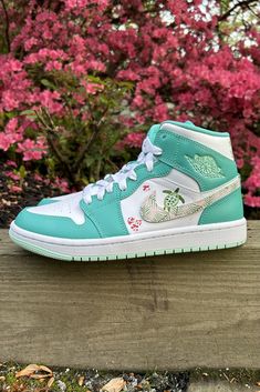 Custom hand-painted turtle and flowers on Jordan sneakers #tropical #seaturtle #customsneakers #customjordans