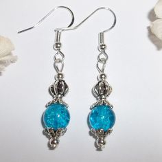 Turquoise Blue Earrings Set Nwt Handmade Pair Earring Earring Earring Set 4598 This Beautiful Nwt Beaded Earring Set Was Handmade By Me With Turquoise Blue Crackled Acrylic Beads. The Pair Also Have Silver Toned Costume Jewelry Beads That Were Antiqued In Black. They Dangle & Drop From 925 Sterling Silver French Hooks For Women Or Girl's Pierced Ears. Measure 1 7/8 Inches Tall & 3/8 Inches Wide. Each Single Earring Weighs About 2.2 Grams. The Perfect Little Fashion Accessory To Liven Up Your War Blue Earrings With Colorful Beads For Gift, Blue Pierced Earrings With Round Beads, Light Blue Round Bead Earrings For Gift, Turquoise Dangle Beaded Earrings For Gift, Blue Round Beads Pierced Earrings, Blue Dangle Earrings With Colorful Beads, Blue Colorful Beads Dangle Earrings, Handmade Blue Bohemian Clip-on Earrings, Blue Statement Earrings