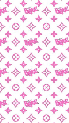 the back side of a pink and white wallpaper with different designs on it, including letters