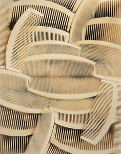 an intricately designed piece of wood that looks like it is made out of strips of plywood