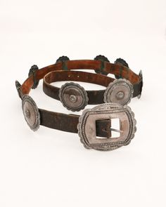 A special Native American concho belt with 9 stamped individual conchos and a buckle. Sterling or coin silver depending on its age. This is most likely from 1930/40’s. One concho is loose at copper backing (see photo). Otherwise in great, wearable condition. MEASUREMENTS Fits 32-39 inch (holes can be added to adjust further) Width of belt 7/8 inch Conch size 1 7/8 inches Buckle size 2 5/8 x 2 1/4 inches Total length 43 inches Concho Belts, Concho Belt, Levi’s 501, Conch, Leather Belt, Native American, Size 2, Buckle, Stamp