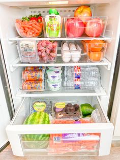 an open refrigerator filled with lots of food