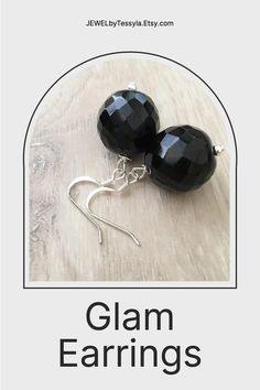 These handcrafted black onyx earrings are simply stunning! Silver fish hooks featuring a large 18mm round faceted black onyx gemstone and measuring 1.5 inches in length. Perfect for any formal occasion! Classic Onyx Round Earrings, Classic Round Onyx Earrings, Classic Onyx Jewelry For Party, Onyx Drop Earrings For Party, Elegant Black Plug Earrings As Gift, Black Gemstone Drop Earrings, Classic Onyx Earrings Gift, Black Onyx Round Earrings, Handmade Black Earrings For Formal Occasions