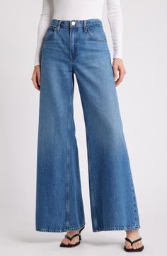 These '70s-inspired flared jeans are remade for today from premium nonstretch denim in a casual-chic dark wash. 32" inseam; 29" leg opening; 11" front rise Zip fly with button closure Five-pocket style 80% regenerative cotton, 20% recycled cotton Machine wash, dry flat Imported Dark Wash Flares With Five Pockets For Fall, Denim Blue Cotton Flares For Fall, Dark Wash Full Length Flares For Spring, Dark Wash Cotton Flares For Fall, Denim Blue Wide Leg Flare Jeans For Fall, Wide Leg Flare Jeans In Denim Blue For Fall, Spring Dark Wash Full-length Flares, Wide Leg Denim Blue Flare Jeans For Fall, Fall Wide Leg Flare Jeans In Denim