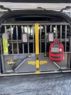 the back end of a car with luggage in it