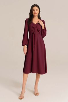 Radiate feminine charm in this dress. The delicate bow-knot detail adds a touch of sweetness, while the long sleeves provide a cozy and modest look. Perfect for any occasion, this midi dress effortlessly combines comfort and fashion.Material : 98%Polyester+2%ViscoseElasticity : NoneSku : CL2433A23*Package : 1*DressCare instructions:Do Not Bleach.Separate dark colors.Iron Low Heat. Elegant Long Sleeve Midi Dress With Tie Waist, Chic Long Sleeve Dresses With Bow, Long Sleeve Solid Color Midi Dress For Brunch, Chic Long Sleeve Midi Dress With Bow, Long Sleeve Fall Dress With Bow, Long Sleeve Dress With Bow For Fall, Feminine Red Midi Dress For Fall, Fall Knee-length Dresses With Bow, Long Sleeve Winter Dress With Bow