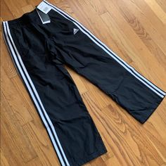 Adidas Nylon Training Pants, Boys S, Nwt. Elastic Waist With Drawstring. Perfect Condition. Adidas Sports Nylon Pants, Adidas Nylon Sports Pants, Adidas Nylon Bottoms For Streetwear, Casual Adidas Nylon Pants, Casual Nylon Adidas Pants, Adidas White Sportswear Bottoms, White Adidas Sports Pants, Black Nylon Adidas Bottoms, Adidas Black Nylon Bottoms