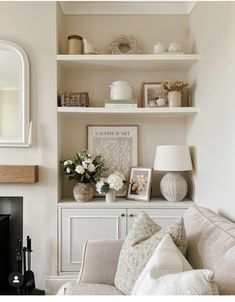 a living room filled with furniture and decor