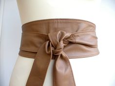 My stylish tan real leather obi belts / sash belts are handmade in high quality soft Spanish leather. 230cm (90") long and 10cm (4") at its wider point All my belts are 100% Real Leather Obi belts go around the waist twice and then tie at the front or side in a bow or knot. An opening on the side allows the opposite end to thread through, thus sitting nice and flat on your waist. These fab obi belts will accentuate your waist and show your curves in the right places.  Wide obi belts are the fini Double Wrap Belt, Leather Obi Belt, Leather Wrap Belt, Wide Leather Belt, Obi Belt, Wrap Belt, Suede Belt, Sash Belts, Sash Belt