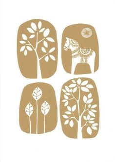 four blue and white paper cut designs with trees, flowers, and animals on them