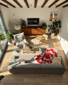 an overhead view of a living room with couches and chairs