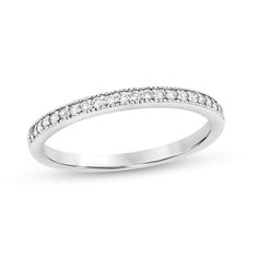 a white gold wedding band with diamonds