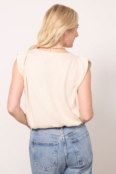 Designed with a folded shoulder detail, this LNA tank will take you from day to night in style, featuring a v-neck silhouette, adjustable tie hem, and soft, drapey lyocell fabric. | LNA Women's Rayden Tank Top, Size XL, Taupe Chic Viscose V-neck Tank Top, Spring Viscose V-neck Top, Viscose V-neck Top For Day Out, V-neck Rayon Tops For Day Out, Rayon V-neck Tops For Day Out, Relaxed Fit V-neck Tank Top For Spring, Chic Relaxed Fit V-neck Top For Day Out, Chic Rayon Tops For Brunch, Chic Relaxed Fit V-neck Top For Summer