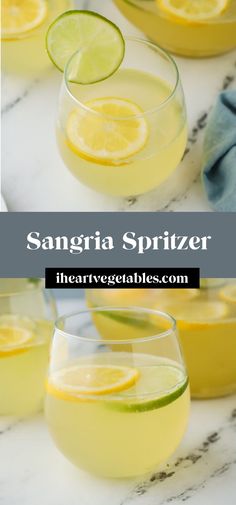 sangria spritzer with lemon and limes in glasses on a marble table