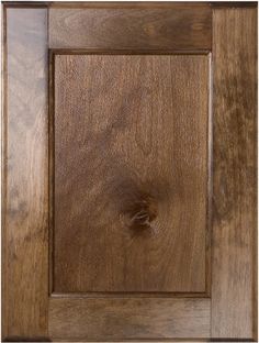 a close up view of the wood grains on this cabinet door, which is made out of solid oak